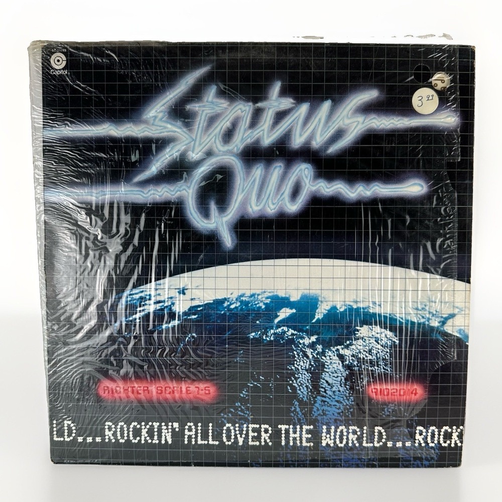 Sealed Status Quo rockin all over the world Lp